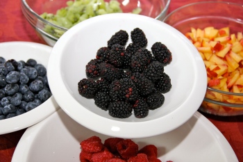 Fruit and berries prepared for filling of The Pyramid cake